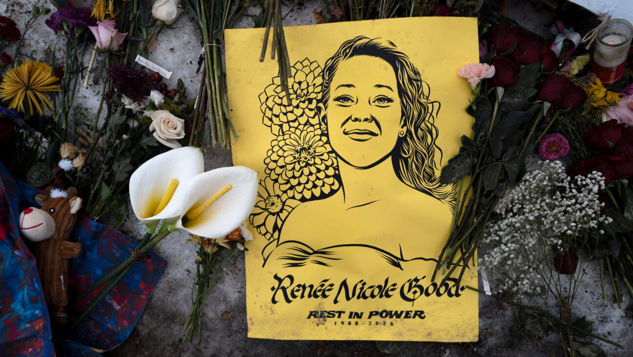 A portrait of Renée Nicole Good sits among other items at a memorial  on Jan. 15.