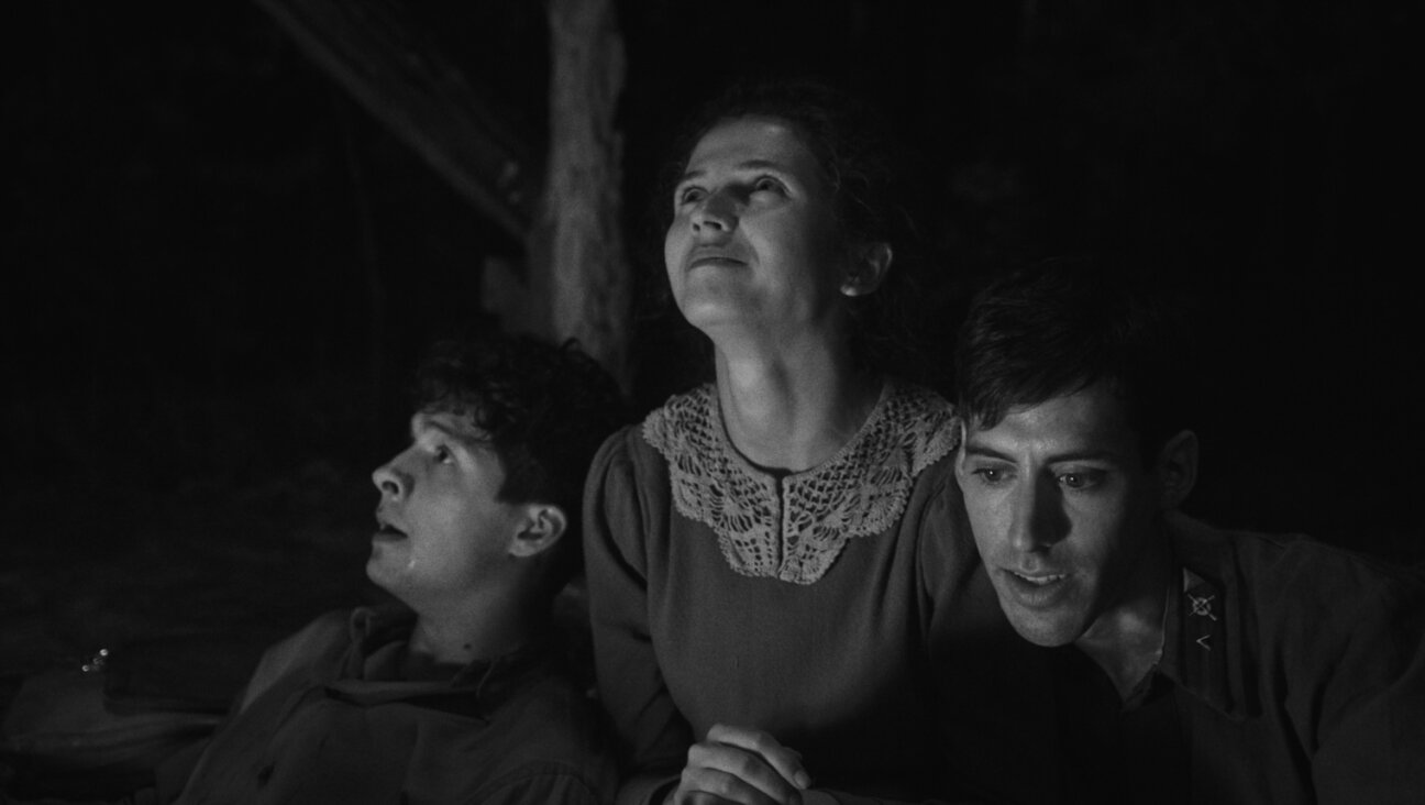 The three protagonists of 'Shttl' before their bright visions for the future are dashed.