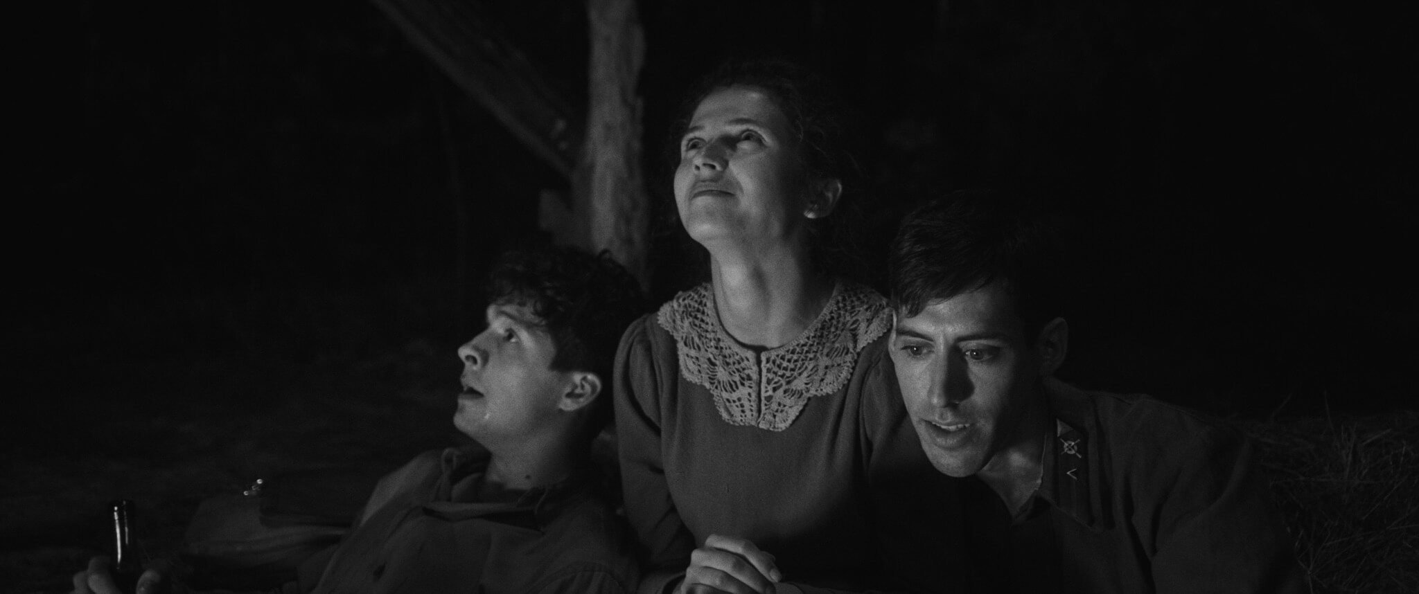 The three protagonists of 'Shttl' before their bright visions for the future are dashed.