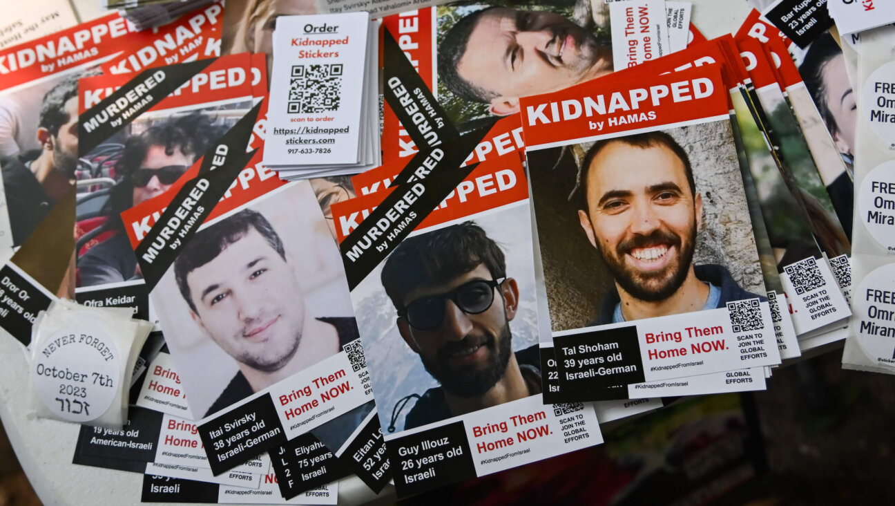 Posters of Israeli hostages are seen during a rally to mark the first anniversary of the Oct. 7 Hamas attack on Israel on Oct. 6, 2024 in New York City.
