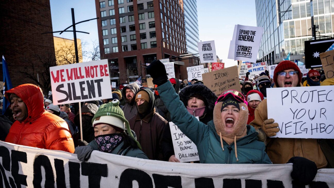 A crowd of protesters against Immigration and Customs Enforcement march through downtown Minneapolis on Jan. 25.