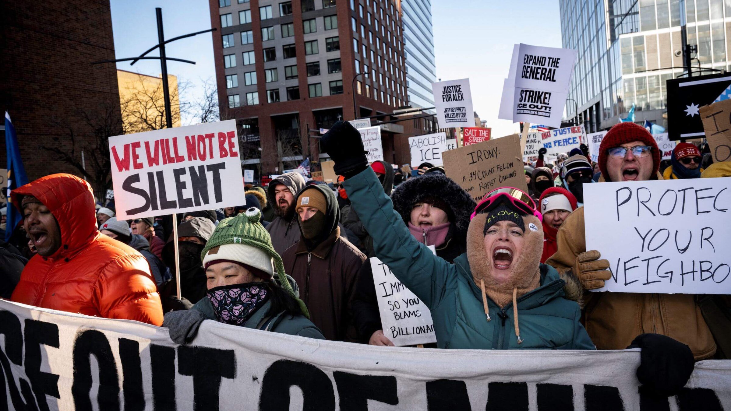 A crowd of protesters against Immigration and Customs Enforcement march through downtown Minneapolis on Jan. 25.