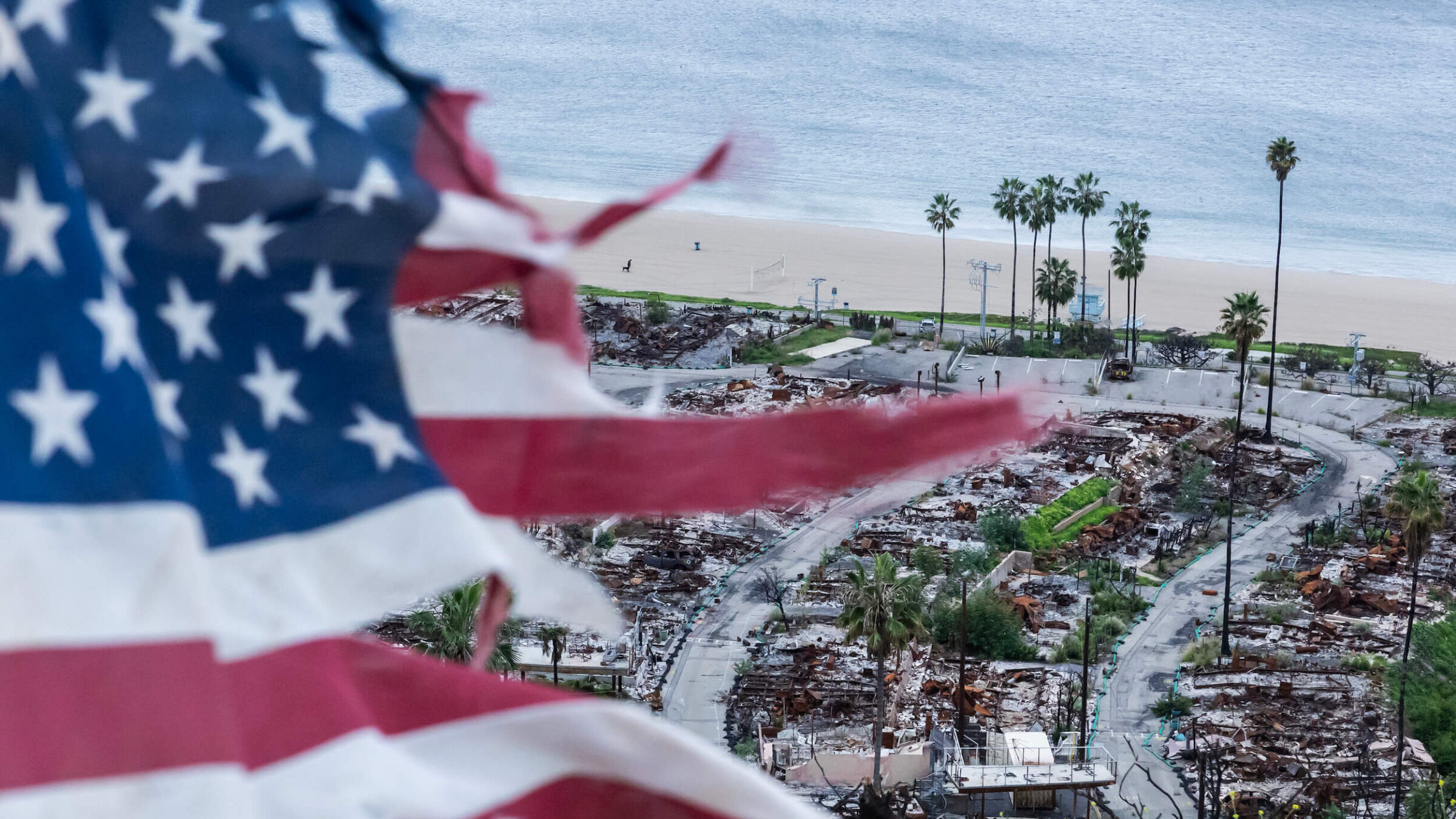 A tattered U.S. flag at Asilomar View Park above the Pacific Palisades Bowl Mobile Estates in Pacific Palisades, CA on Dec. 31, 2025.