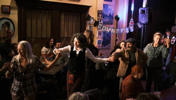 People dancing on the first night of the Richmond Yiddish Week festival, Jan. 10, at the Gold Lion Community Café in Richmond, Virginia. 