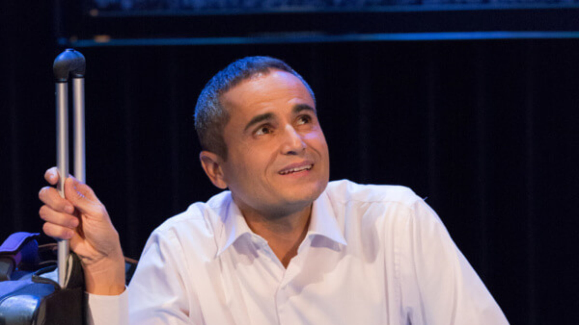 Miari, with a suitcase that will cause him oh-so-much-trouble