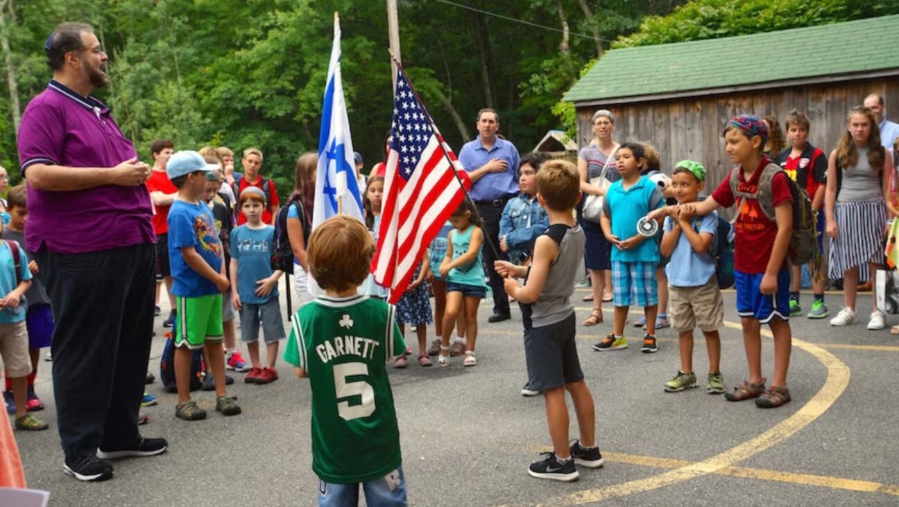 Scott Sokol, head of school at MetroWest Jewish Day School in Framingham, Massachusetts, leading morning circle, in 2019.