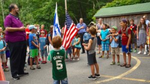 Scott Sokol, head of school at MetroWest Jewish Day School in Framingham, Massachusetts, leading morning circle, in 2019.