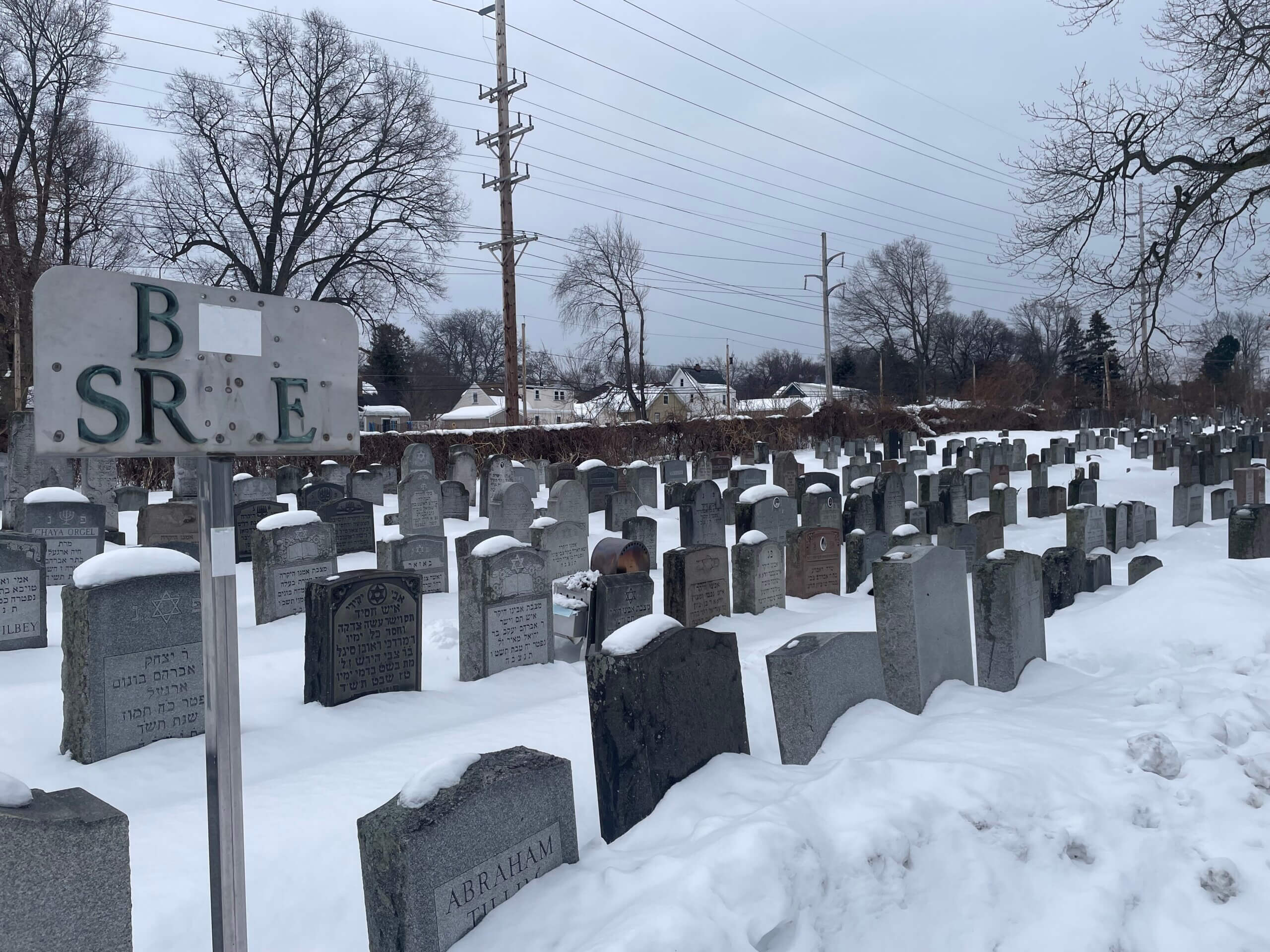 Rabbi Yechiel Meir Burgeman's grave is one among many at a Jewish cemetery in Rochester, New York.