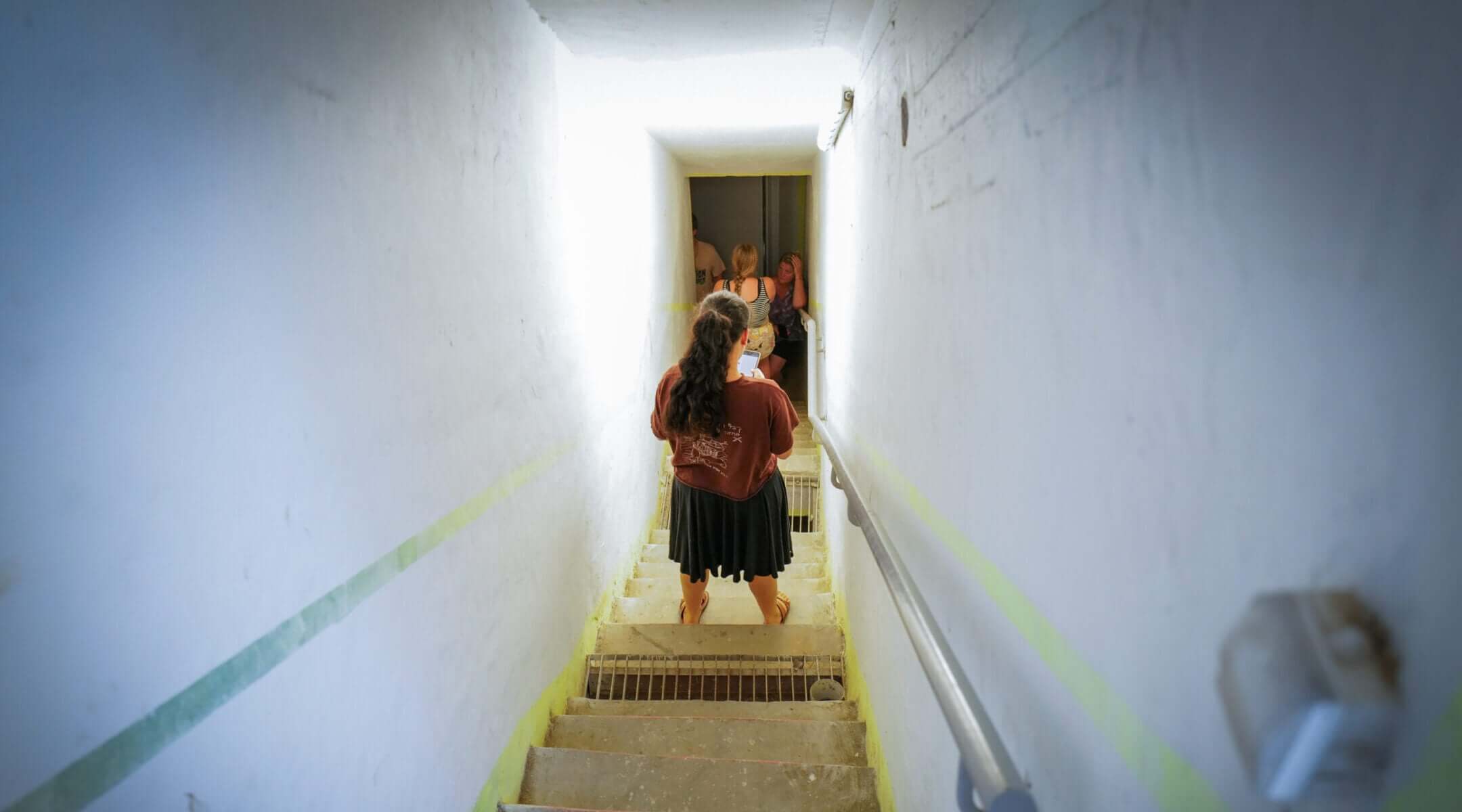 Embracing go-bags and gallows humor, Israelis live in limbo as Trump teases war with Iran