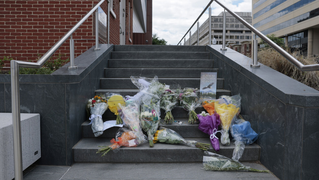 Handwritten notes and flowers are left outside the Lillian and Albert Small Capital Jewish Museum on May 23, 2025 in Washington, DC.