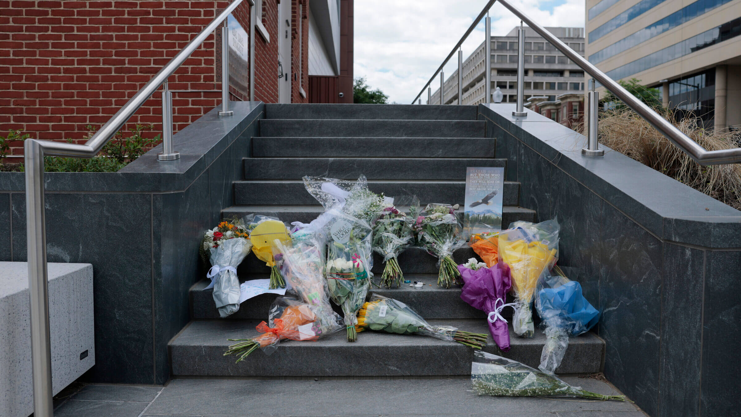 Handwritten notes and flowers are left outside the Lillian and Albert Small Capital Jewish Museum on May 23, 2025 in Washington, DC.