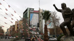 A giant billboard displaying a map of potential targets in Israel’s Tel Aviv area along with a warning message reading “You start, we finish!” is seen at Palestine Square in Tehran, Iran, Feb. 9, 2026.