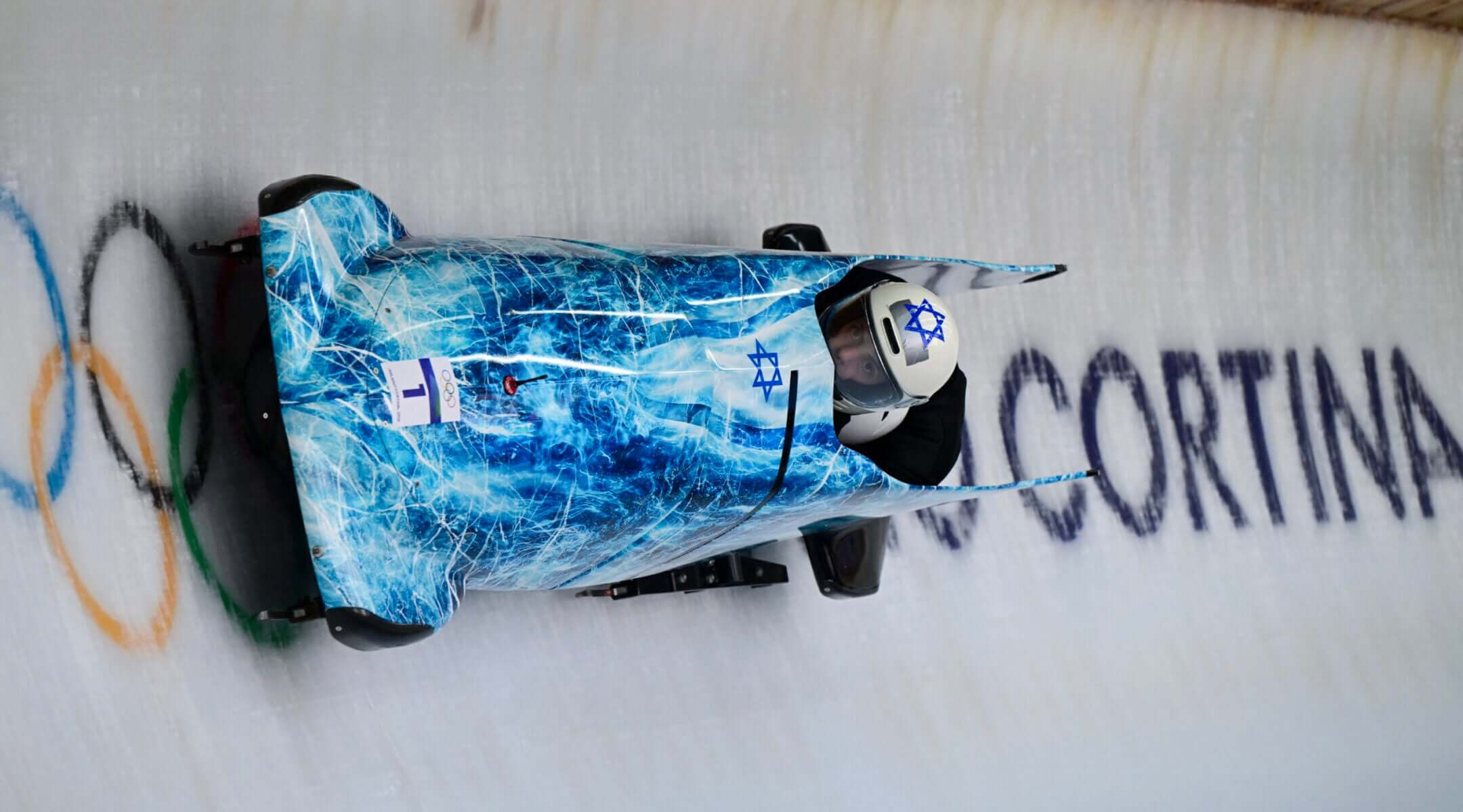 Israel’s AJ Edelman pilots in the bobsleigh men’s two-man training Heat 4 at Cortina Sliding Centre during the Milano Cortina 2026 Winter Olympic Games in Cortina d’Ampezzo on Feb. 13, 2026.