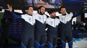 AJ Edelman, Menachem Chen, Uri Zisman and Omer Katz after completing the second run of the four-man bobsled competition at the 2026 Winter Olympics, Feb. 21, 2026, in Cortina, Italy.