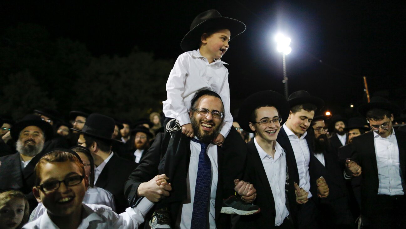Orthodox Jews in the village of Kiryas Joel, New York, May 14, 2017, during celebrations for the Jewish holiday of Lag BaOmer, marking the anniversary of the death of Talmudic sage Rabbi Shimon Bar Yochai approximately 1,900 years ago. 