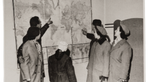 Refugees from Hungary gather in the HIAS Vienna office, some expressing a desire to immigrate to the United States, and others to Australia, where they have relatives.