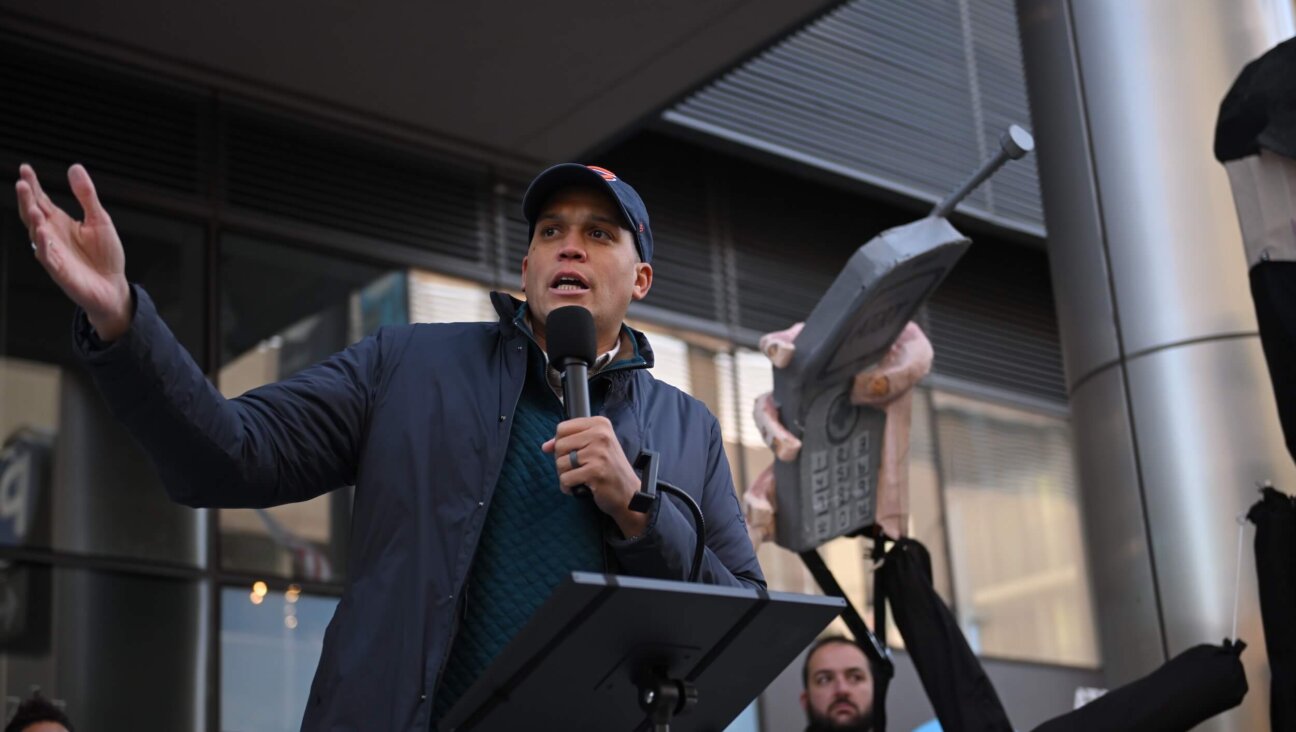 Illinois State Sen. Robert Peters speaks during a protest in Chicago to hold AT&T accountable for contracts with DHS, CBP, and ICE on Nov. 16, 2025. 
