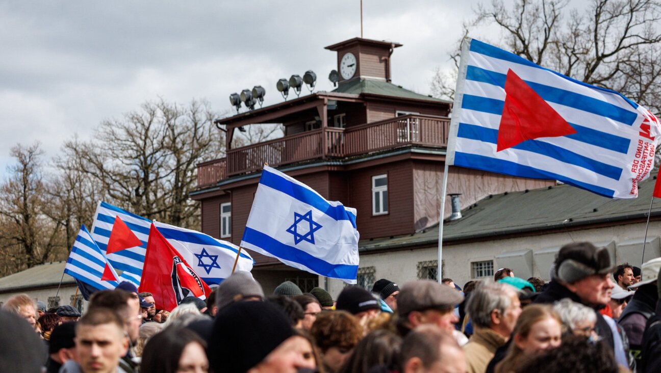 People attend the commemoration to mark the 80th anniversary of the liberation of the Buchenwald Nazi concentration camp at the camp’s memorial site in Buchenwald, near Weimar, eastern Germany, on April 6, 2025. (JENS SCHLUETER / AFP)