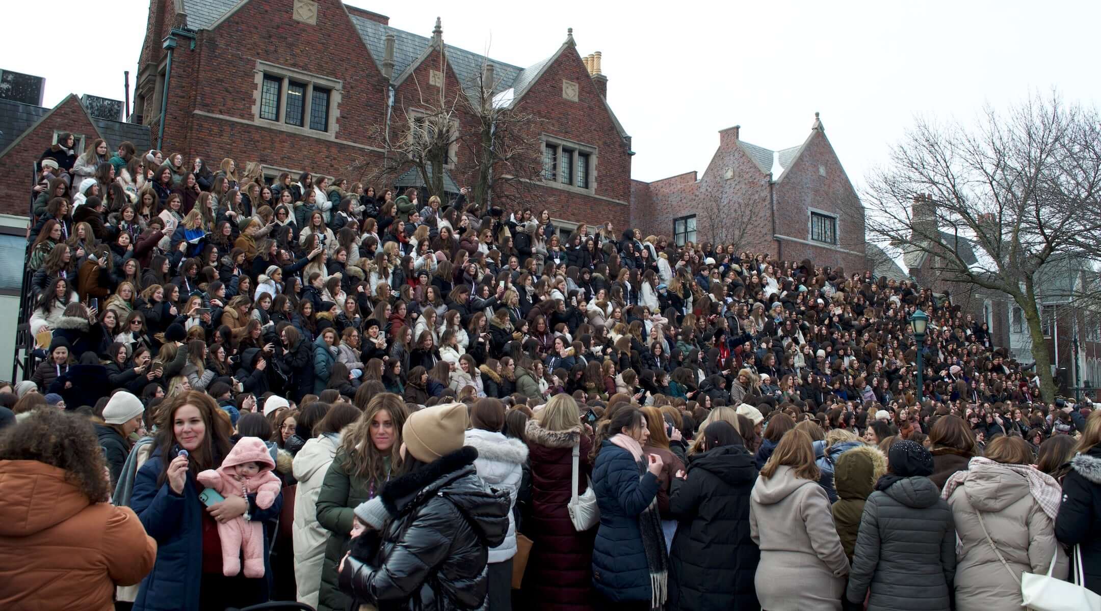 Female emissaries of the Chabad-Lubavitch movement gather for a group photo in Crown Heights, Brooklyn, on Feb. 6, 2026.