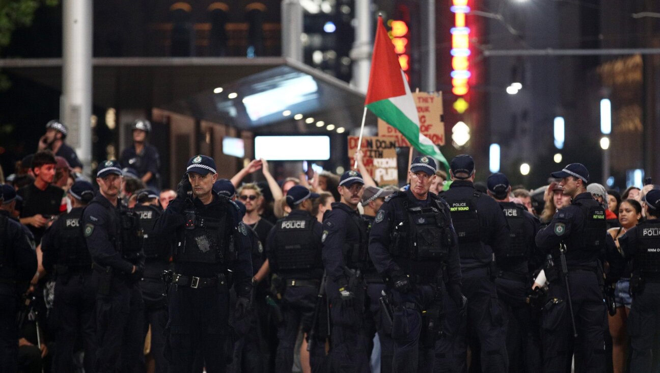 NSW Police surround protesters on George Street during a rally against the visit of Israel’s President Isaac Herzog on Feb. 9, 2026 in Sydney, Australia. (Lisa Maree Williams/Getty Images)