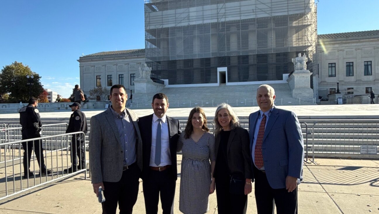 From left, Ben Woldenberg, Stephen Woldenberg, Elana Woldenberg Ruffman, Nadine Woldenberg and Rick Woldenberg pose in front of the Supreme Court building in Washington, D.C. 