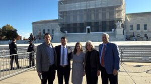 From left, Ben Woldenberg, Stephen Woldenberg, Elana Woldenberg Ruffman, Nadine Woldenberg and Rick Woldenberg pose in front of the Supreme Court building in Washington, D.C. 