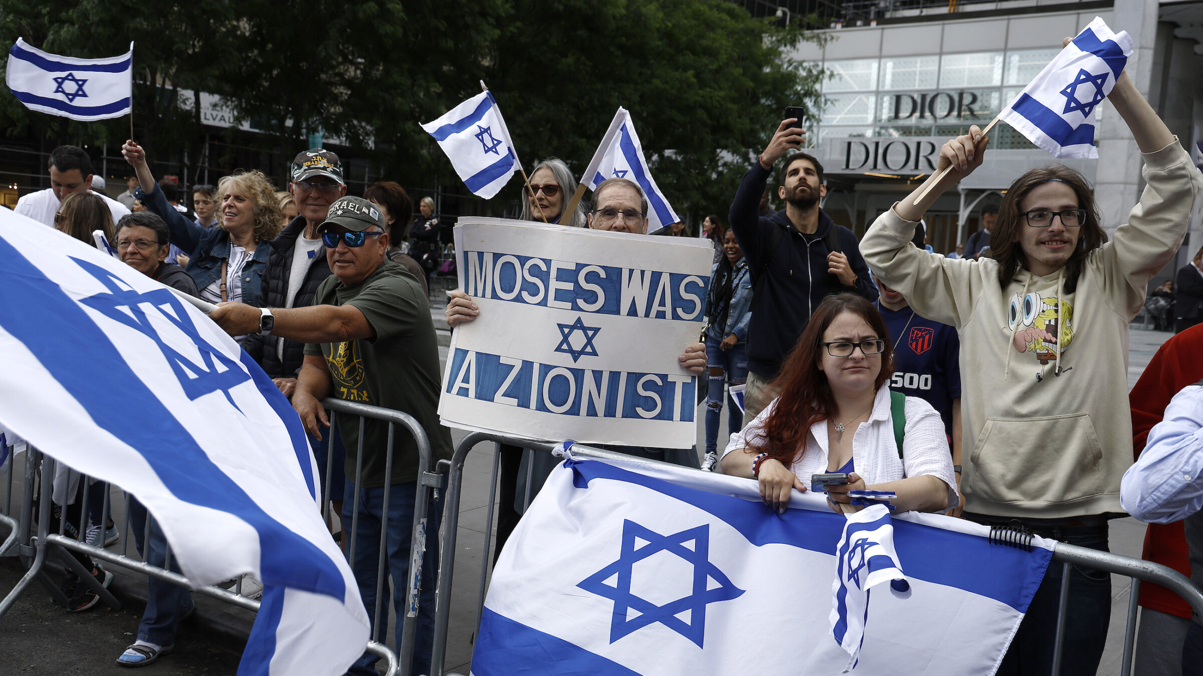 Bystanders cheer the 2023 Celebrate Israel Parade in New York City.