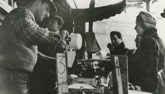 A Lower East Side pickle man serves customers. 