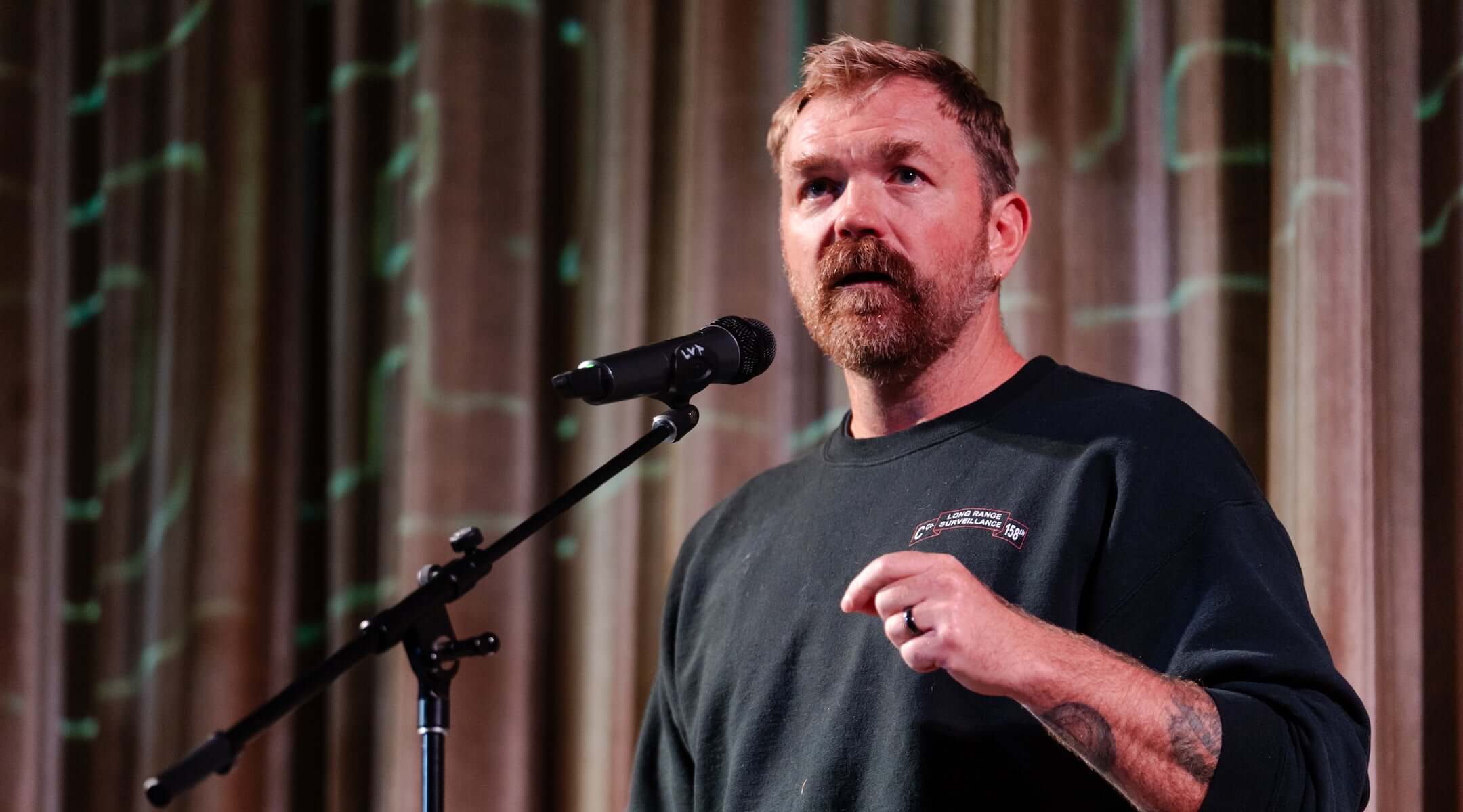 U.S. senatorial candidate from Maine Graham Platner speaks at a town hall at the Leavitt Theater on October 22, 2025 in Ogunquit, Maine. Platner, a veteran of the U.S. Marines and an oyster farmer, is running for the seat held by Sen. Susan Collins (R-ME).