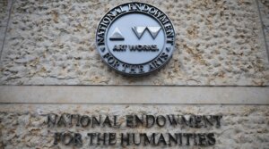 Rain falls on the National Endowment for the Humanities building (NEH) on April 11, 2025 in Washington, DC. The NEH has begun laying off staff after President Donald Trump and the Department of Government Efficiency’s (DOGE) February 11 executive order to reduce the federal workforce.