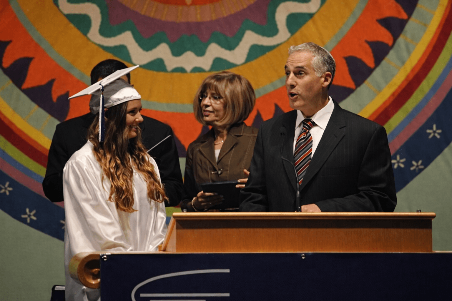 The author, left, with Temple Israel rabbi Josh Bennett, at her graduation from Frankel Jewish Academy in 2011.