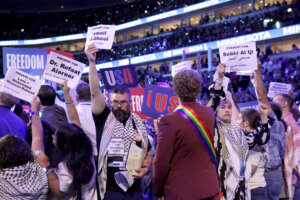 A protest listing names of people killed by Israel during Minnesota roll call  at the 2024 Democratic National Convention at United Center in Chicago.