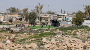 A general view shows the football field and surrounding homes in the village of Umm Al-Khair in Masafer Yatta, south of Hebron, West Bank on Feb. 12, 2026.