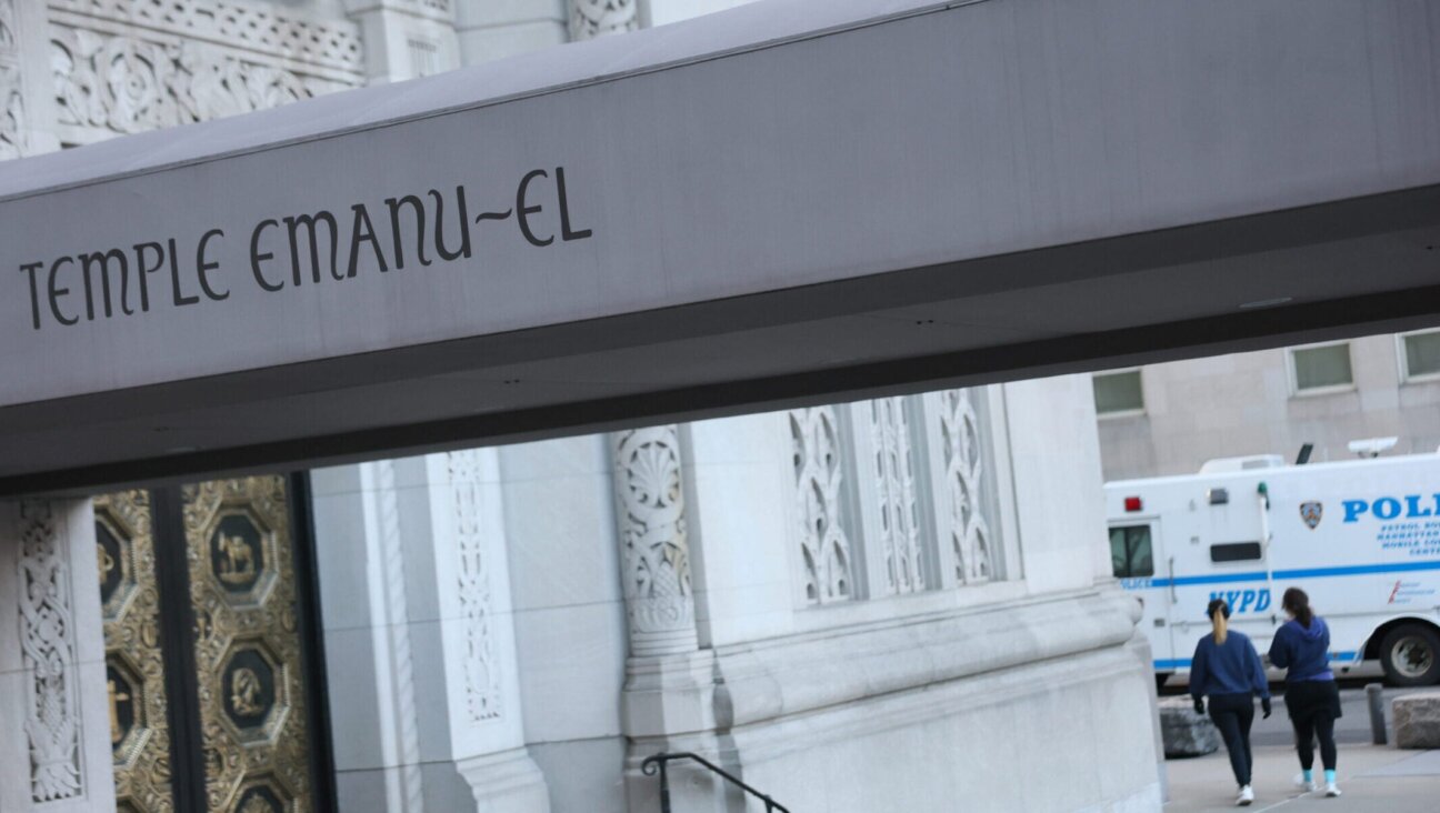 NYPD Mobile Command Center trucks are stationed near Temple Emanu-El on March 13, 2026 in New York City.