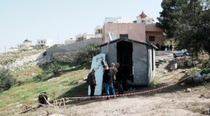 Civil defense and security forces conduct investigations at a hair salon where four women were killed by an Iranian missile in Beit Awwa in the West Bank, March 19, 2026.