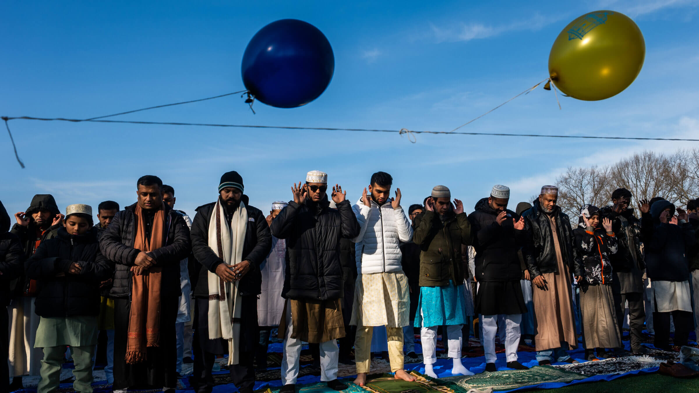 People attend Eid al-Fitr prayers at Brooklyn's Prospect Park on March 20, 2026, in New York City.