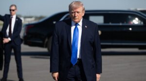 President Donald Trump speaks to reporters before boarding Air Force One at Palm Beach International Airport in West Palm Beach, Florida, on March 23, 2026.