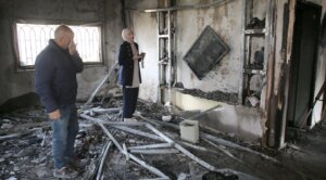 Palestinians inspect a burned-out house following an attack by Jewish settlers, in the West Bank, March 23, 2026. (Nasser Ishtayeh/SOPA Images/LightRocket via Getty Images)
