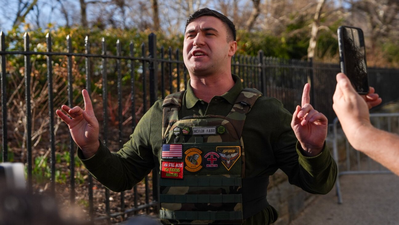 Far-right influencer Jake Lang speaks in front of Gracie Mansion regarding the attempted bombing at a protest organized by the influencer on Saturday, on March 9, 2026 in New York City. Two suspects were arrested on March 7 for allegedly throwing bombs that did not explode during a protest outside Gracie Mansion.