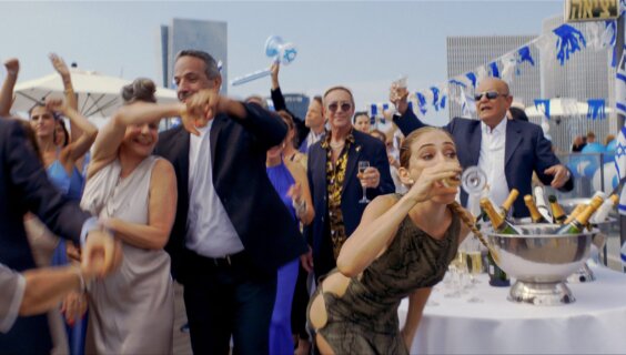The raucous world of <i>Yes!</i> is unsparing in its satire of a country partying near the abyss.
