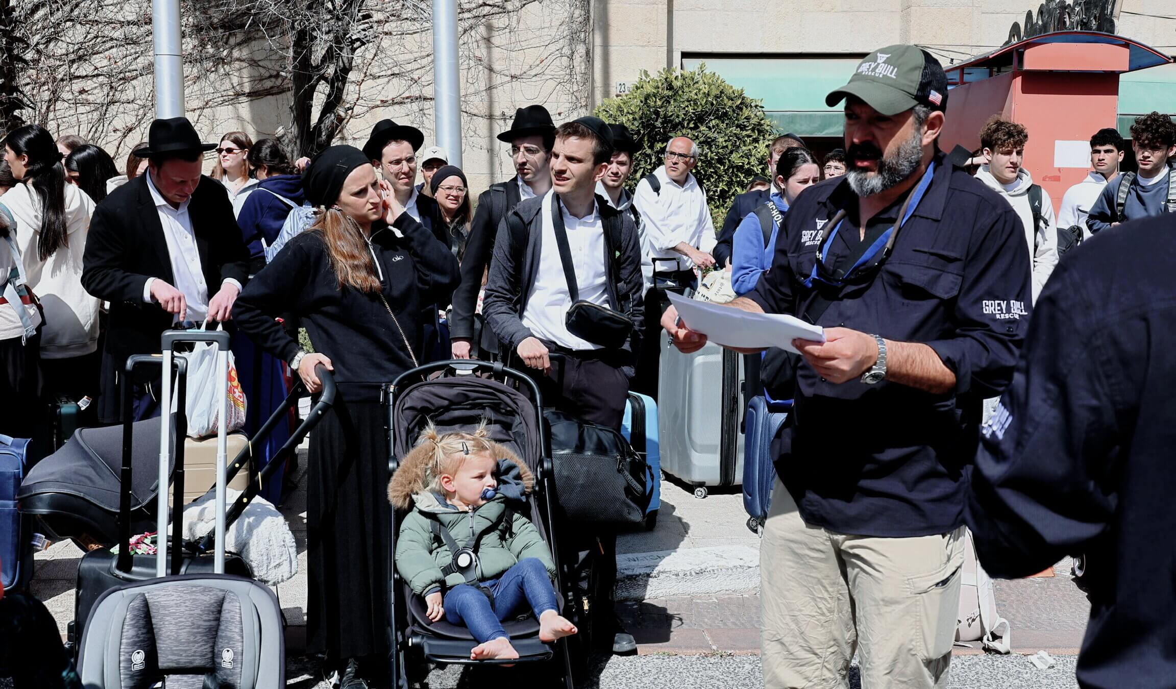 Travelers scramble for an exit from Israel.