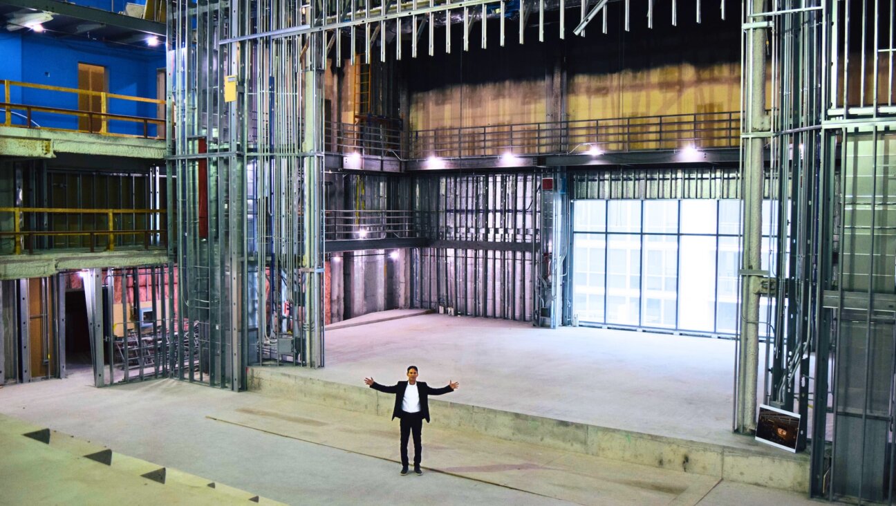 Richard H. Cuenca, the newly appointed head of school for the forthcoming Davis School in Chicago, stands inside the campus as construction continues.