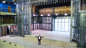Richard H. Cuenca, the newly appointed head of school for the forthcoming Davis School in Chicago, stands inside the campus as construction continues.