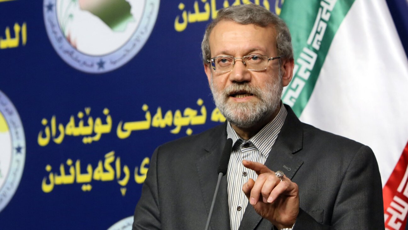 Ali Larijani speaks during a joint press conference with his Iraqi counterpart Salim al-Juburi (unseen) following a meeting on Dec. 24, 2014 in the Iraqi capital Baghdad.