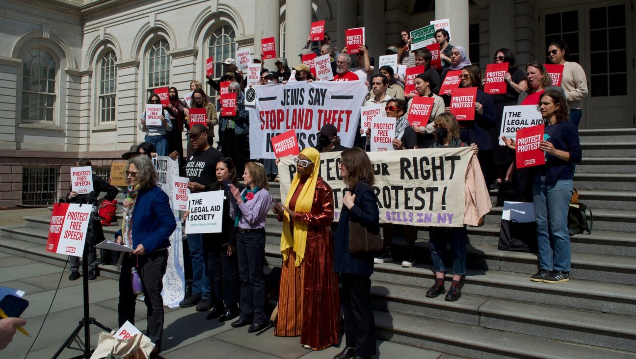 Protesters of the “buffer zone” legislation gather outside New York City Hall on March 26, 2026. (Jewish Telegraphic Agency)
