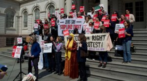 Protesters of the “buffer zone” legislation gather outside New York City Hall on March 26, 2026. (Jewish Telegraphic Agency)