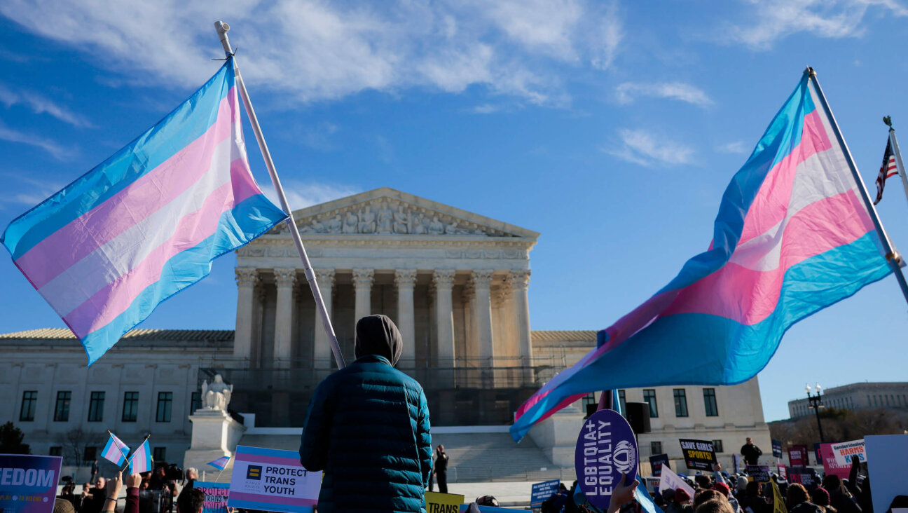 Protesters supporting transgender rights gather outside the Supreme Court on Jan. 13.