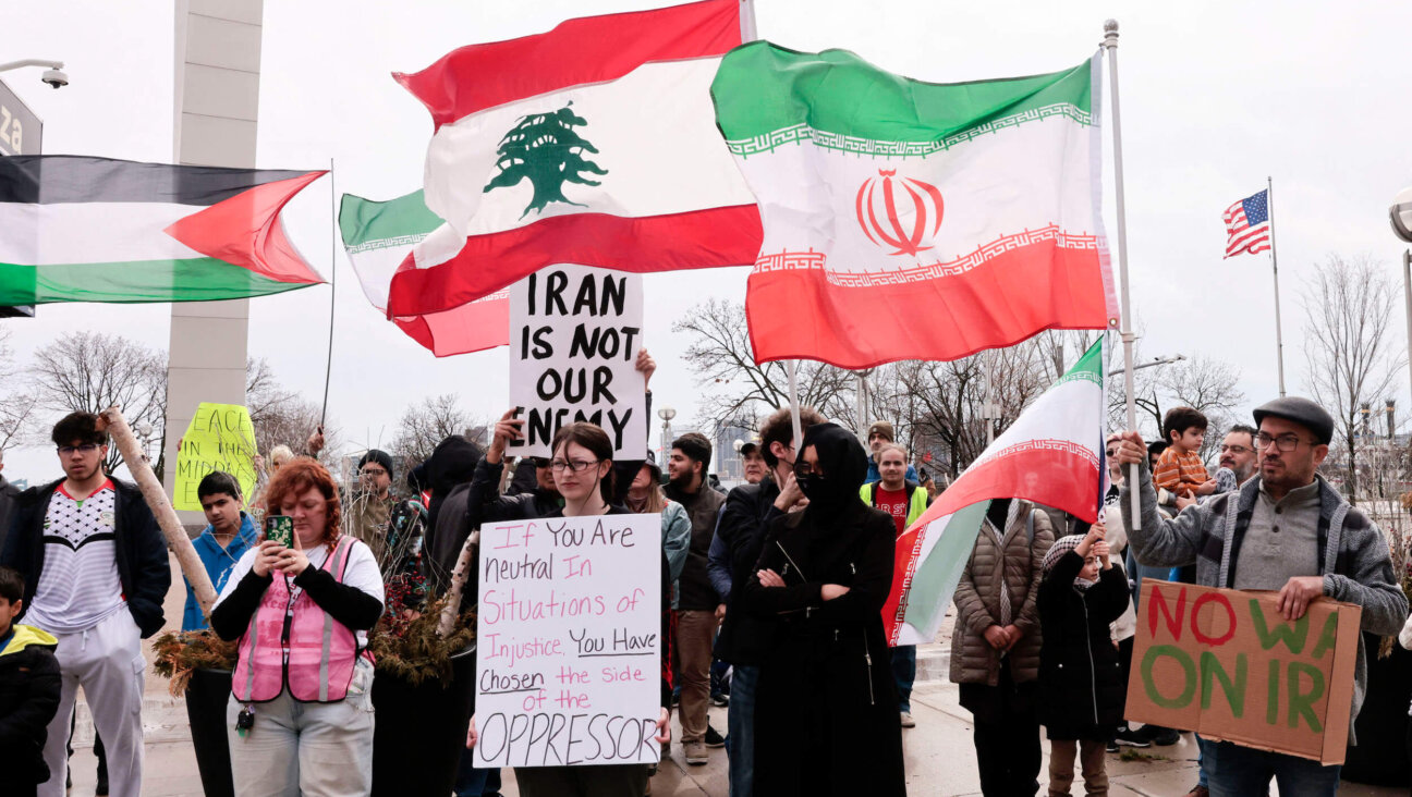 People gather for a "Hands off Iran, Lebanon  and Palestine" rally and march in downtown Detroit, Michigan, on March 7.