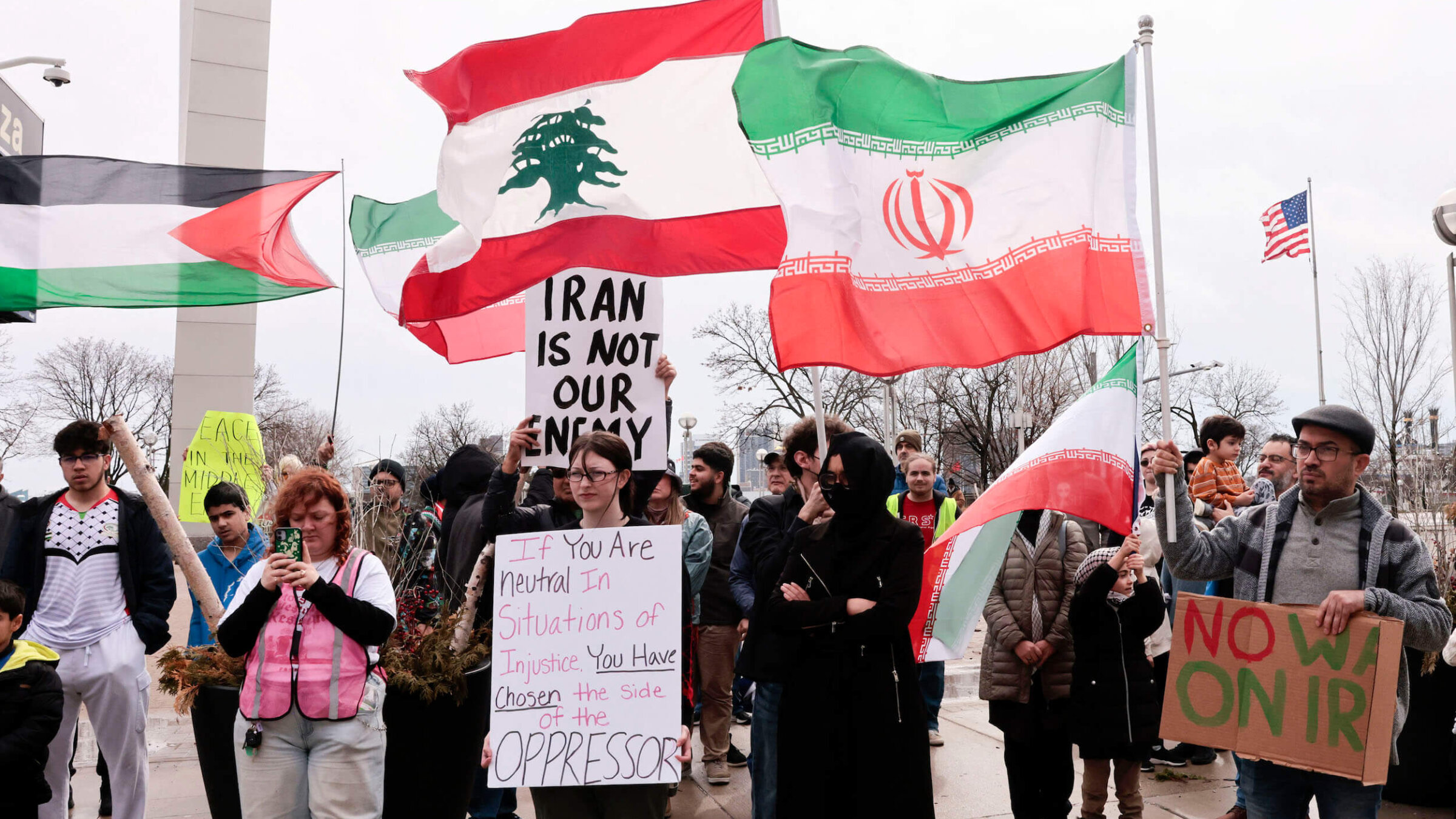 People gather for a "Hands off Iran, Lebanon  and Palestine" rally and march in downtown Detroit, Michigan, on March 7.
