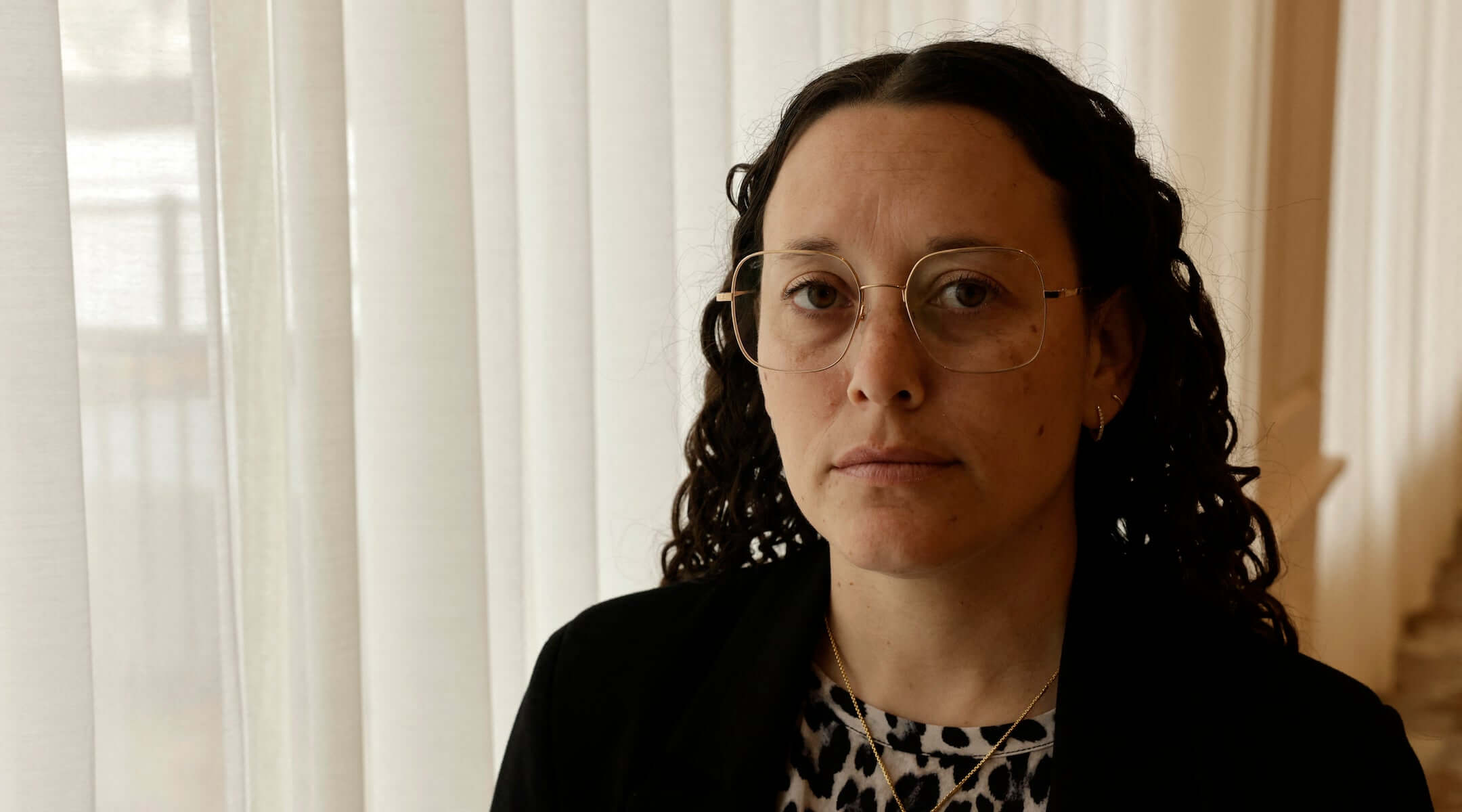 Temple Israel Rabbi Jen Lader talks to a reporter at Shenandoah Country Club in West Bloomfield, Michigan, on March 13, 2026, after Ayman Ghazali drove a vehicle into the building. 